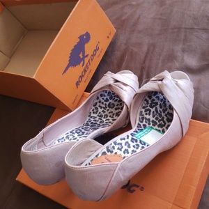 Light pink d'orsay peep toe pumps